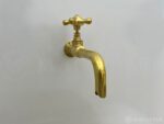 Brass wall faucet