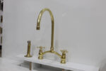 8" Arched Bridge, Polished Unlacquered brass kitchen faucet, Cross Han