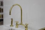 8" Arched Bridge, Polished Unlacquered brass kitchen faucet, Cross Han